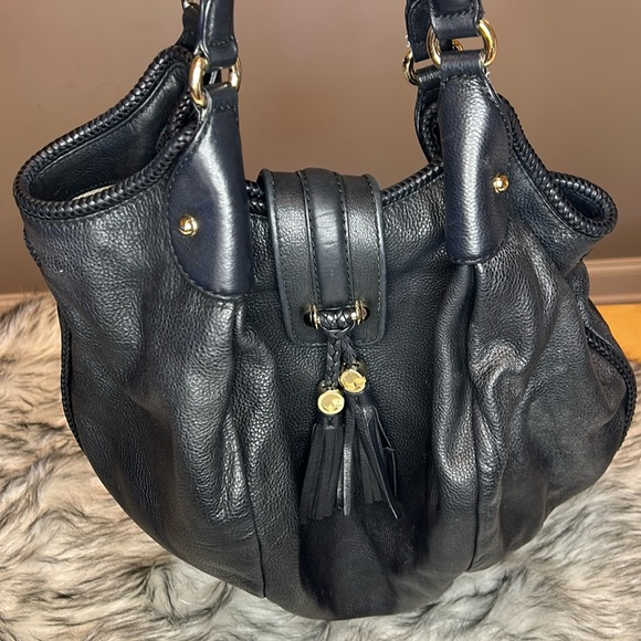Gucci Handbags - Gucci black leather purse with tassels